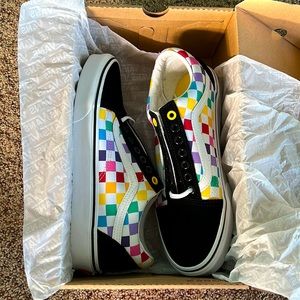rainbow + black checkered vans low top